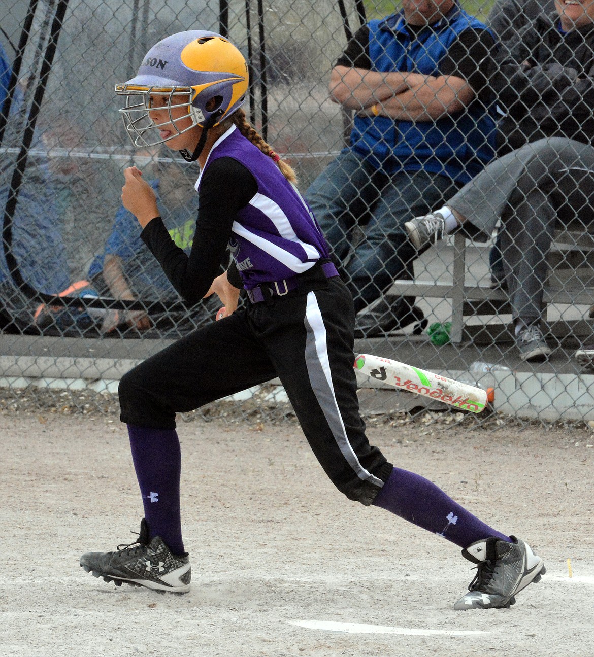 POLSON PURPLE Wave player Nikki Kendall slaps a double into the outfield during Saturday&#146;s pool play in the Polson Splash Softball Tournament Classic. The Purple Wave won the 12U SPLASH Tournament championship. (Jason Blasco/Lake County Leader)