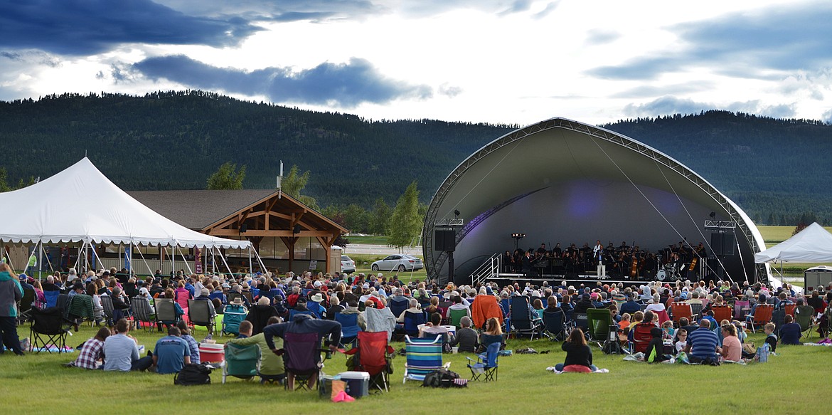 COOL TEMPERATURES and gorgeous skies greeted attendees to a 2016 Glacier Symphony Summer Pops concert at Rebecca Farm on July 8, 2016. (Brenda Ahearn photos/Daily Inter Lake, file)