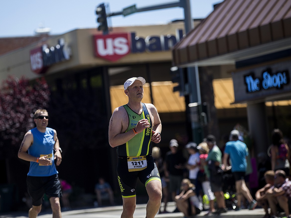 LOREN BENOIT/Press

Ethan Dahlberg approaches the Ironman 70.3 Coeur d&#146;Alene finish line on Sherman Avenue.