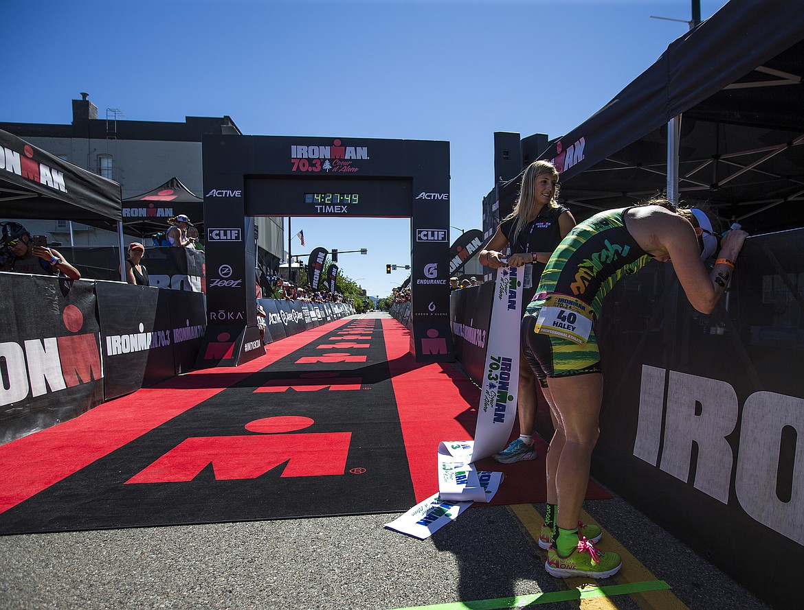 LOREN BENOIT/PressHaley Chura catches her breath after crossing the finish line with a time of of four hours, 27 minutes and 16 seconds, marking her as the fastest female in the race.