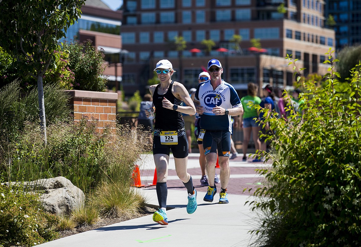 LOREN BENOIT/PressMegan Lyer runs the Ironman 70.3 Coeur d'Alene course in McEuen Park.