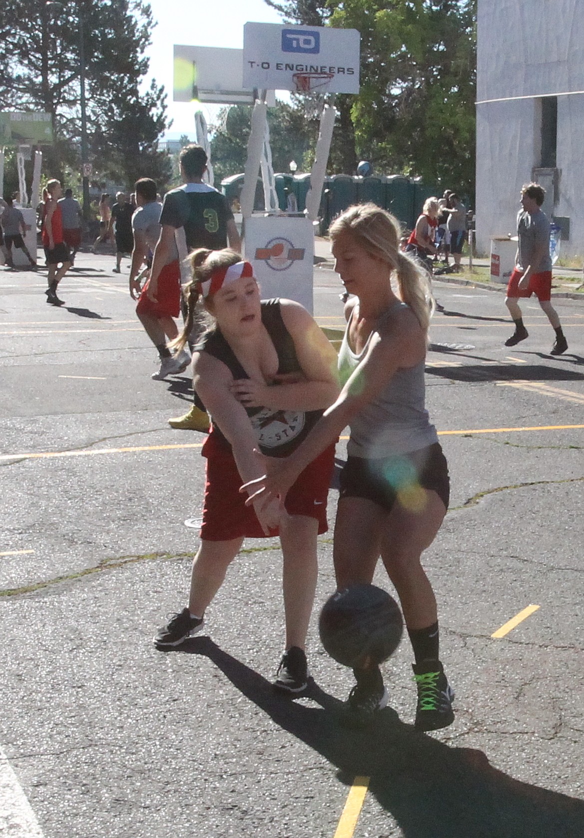 JASON ELLIOTT/Press
Viks Alum player Madison Sumner steals the ball away during her team's 20-8 opening round win against Come on and Slam on Saturday at Hoopfest in Spokane.