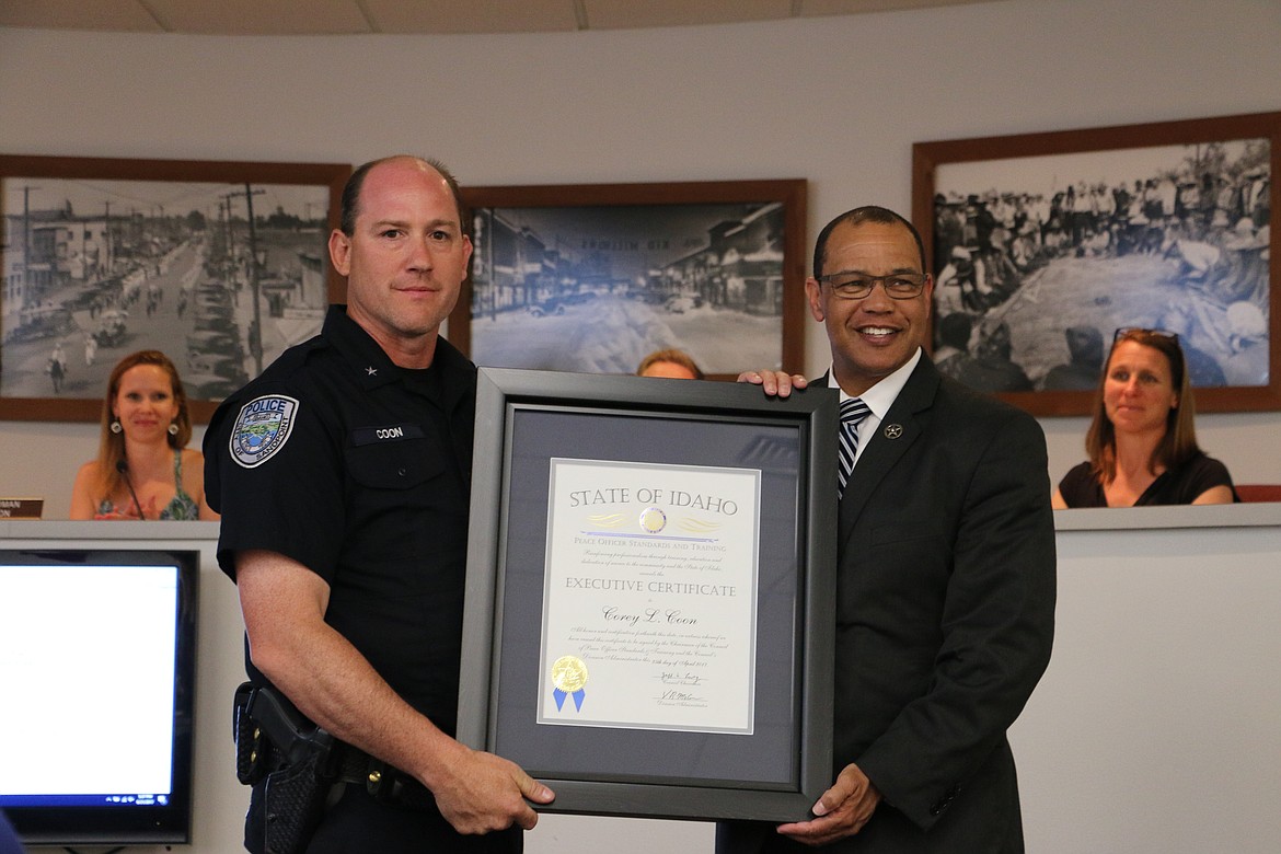 (Photo by MARY MALONE)
Sandpoint Police Chief Corey Coon, left, was awarded the Peace Officer Standards and Training Executive Certificate during Wednesday's City Council meeting, presented to him by Idaho POST Division Administrator Victor McCraw, right.