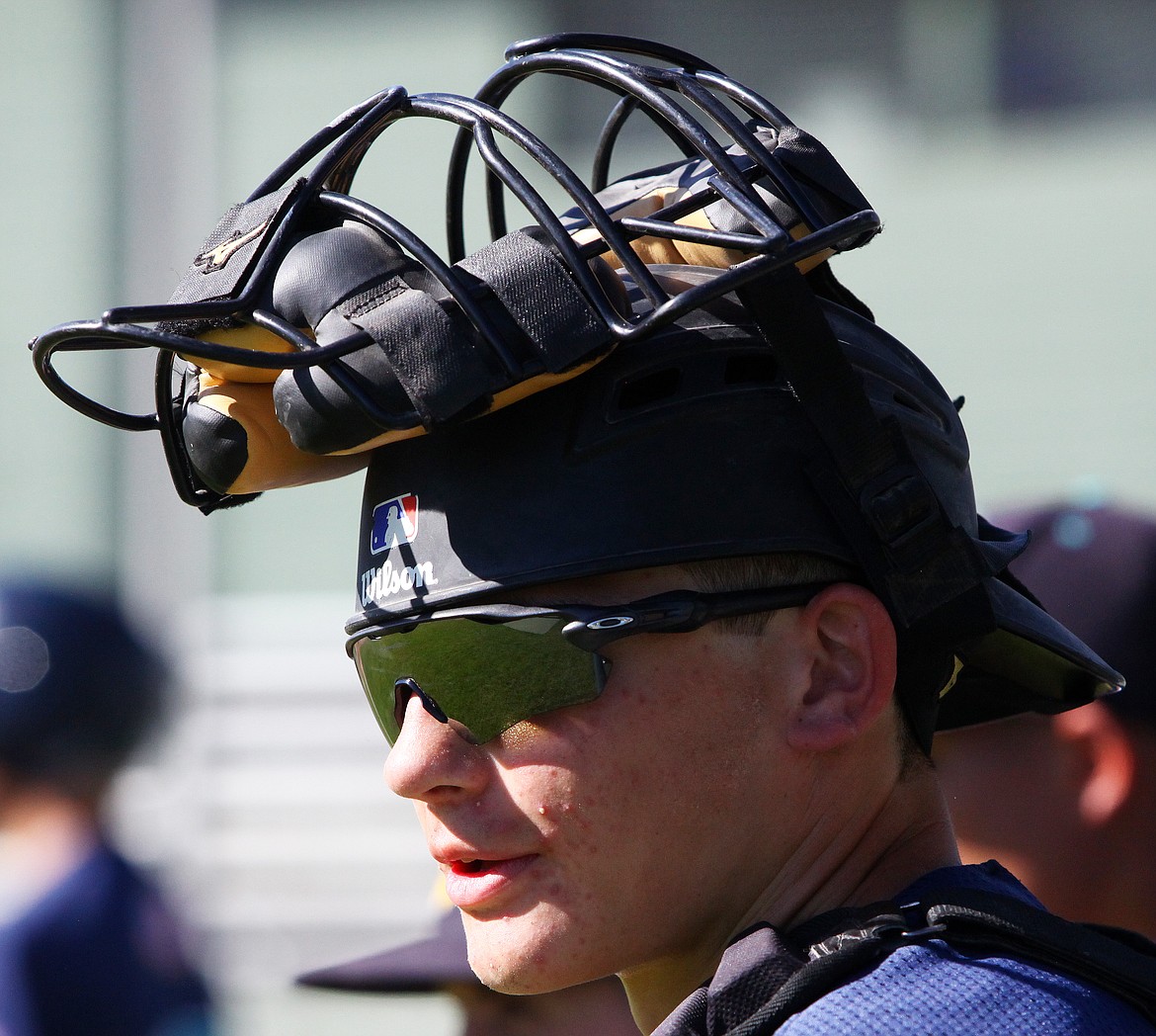 Rodney Harwood/Columbia Basin HeraldEthan Etter of Ephrata is geared up and ready to go in the River Dogs dugout during the High Desert Baseball Classic at Johnson-O'Brien Stadium.