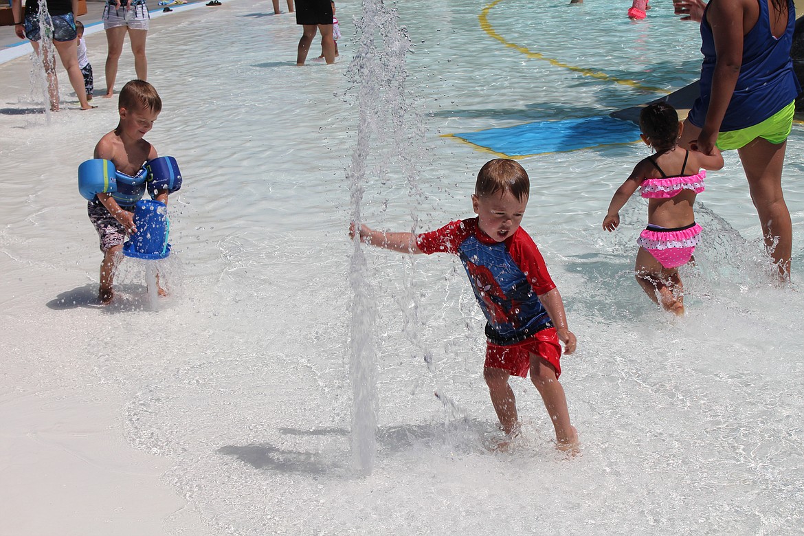 Cheryl Schweizer/Columbia Basin Herald
Summer is here, and a good splash in the shallows is just the ticket on a summer day. The Surf &#145;n Slide water park did brisk business over the weekend.