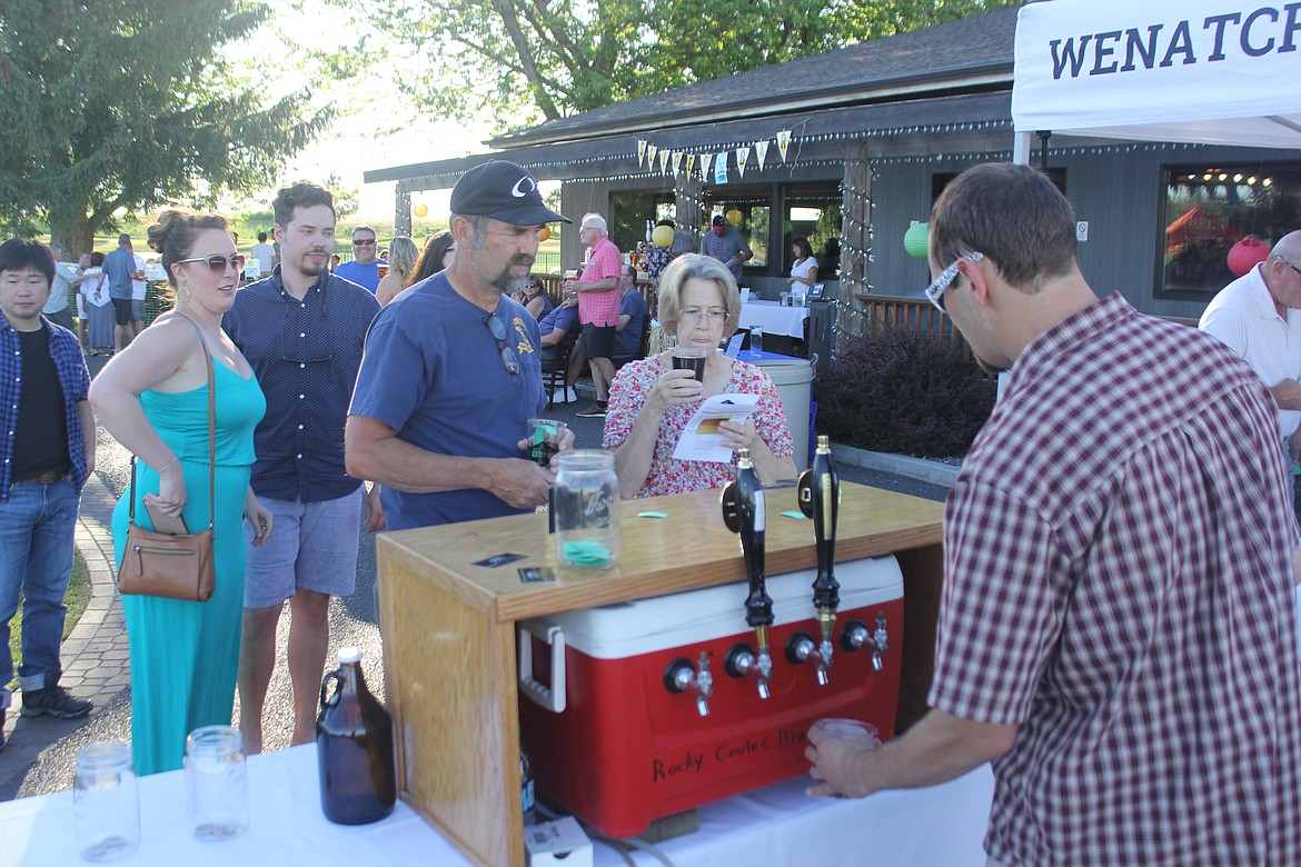 Richard Byrd/Columbia Basin Herald
The lines were long at the several different craft beers booths Saturday night during the Blacktop Bash.