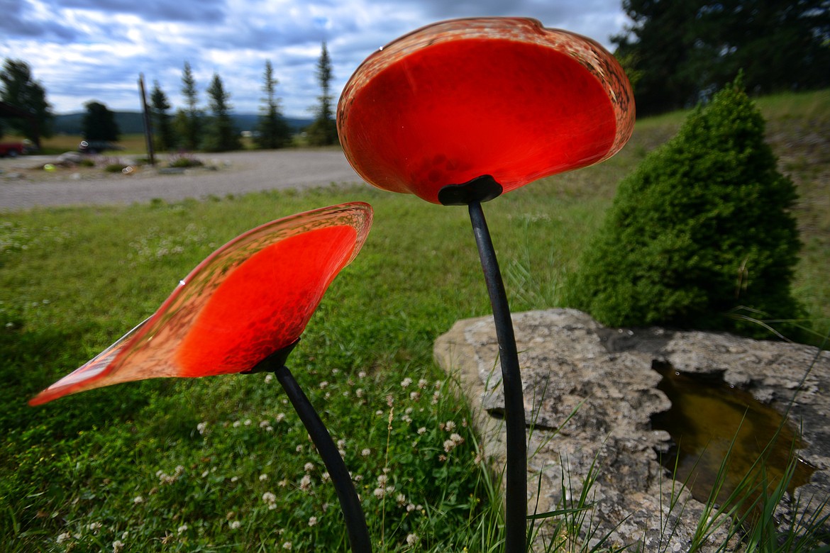 TWO GLASS poppies are planted outside the home of artist Lee Proctor.
(Brenda Ahearn photos/Daily Inter Lake)