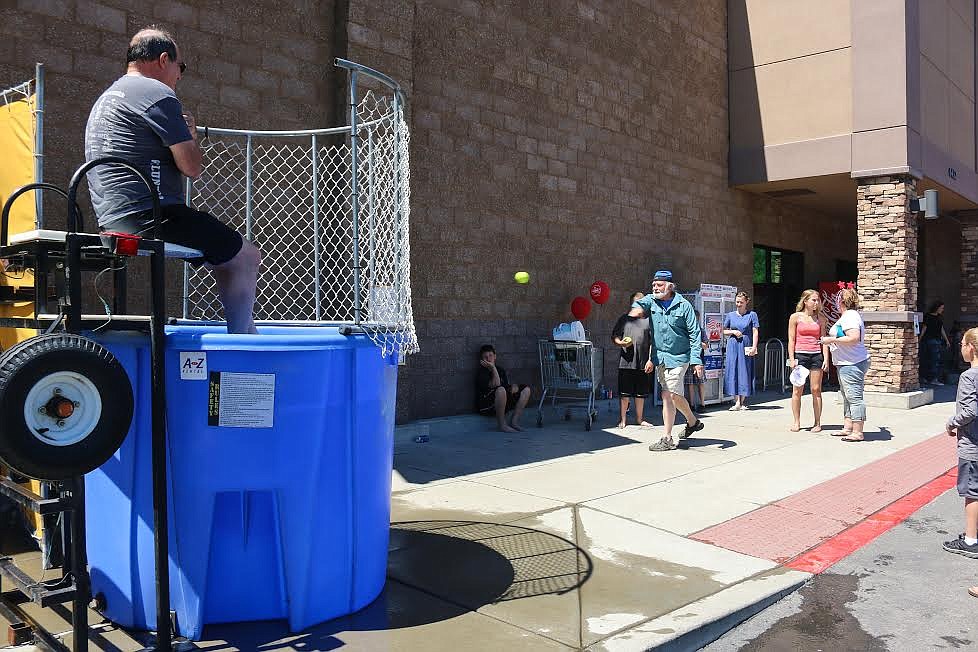 Photo by Mandi Bateman
Joe Ward attempts to take down Thomas Bushnell at the dunk tank.