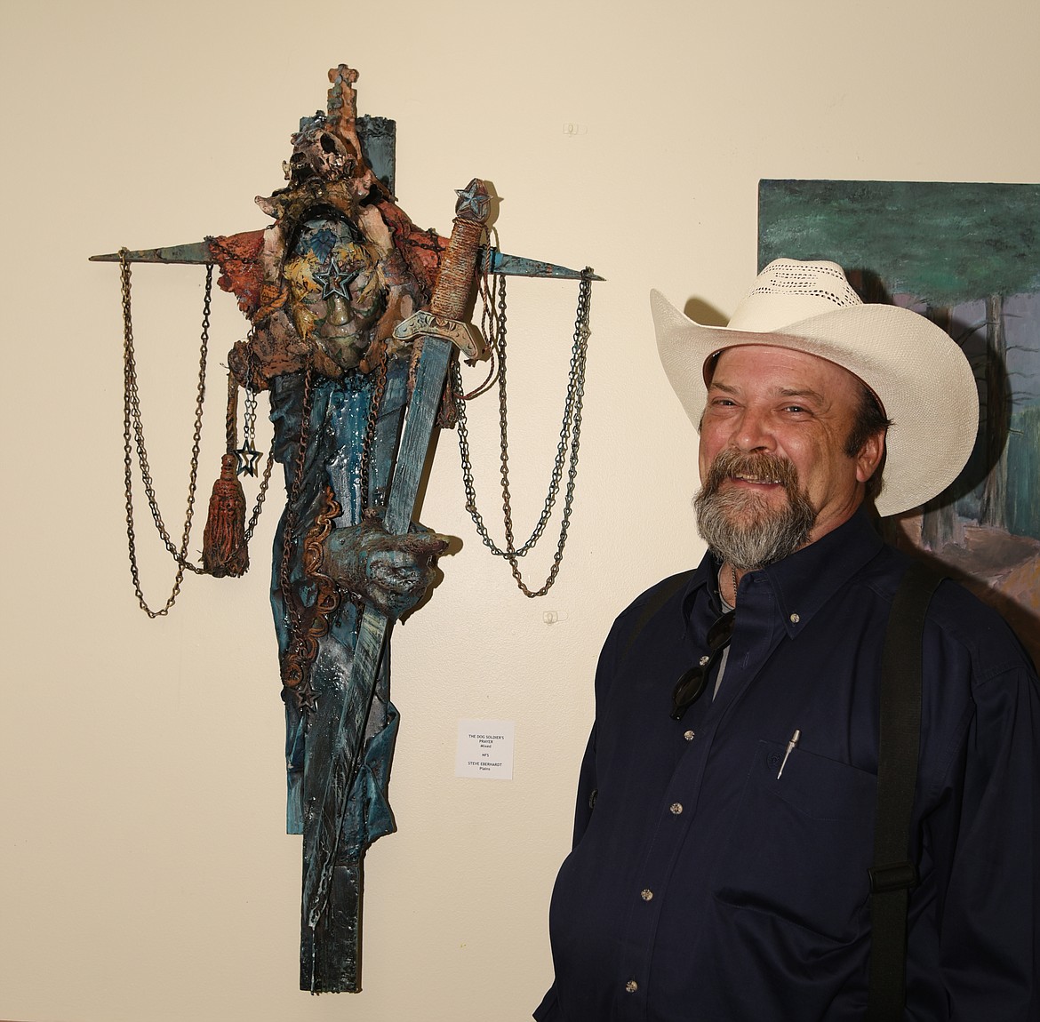 Steve Eberhardt stands by his intricate and interesting sculpture.