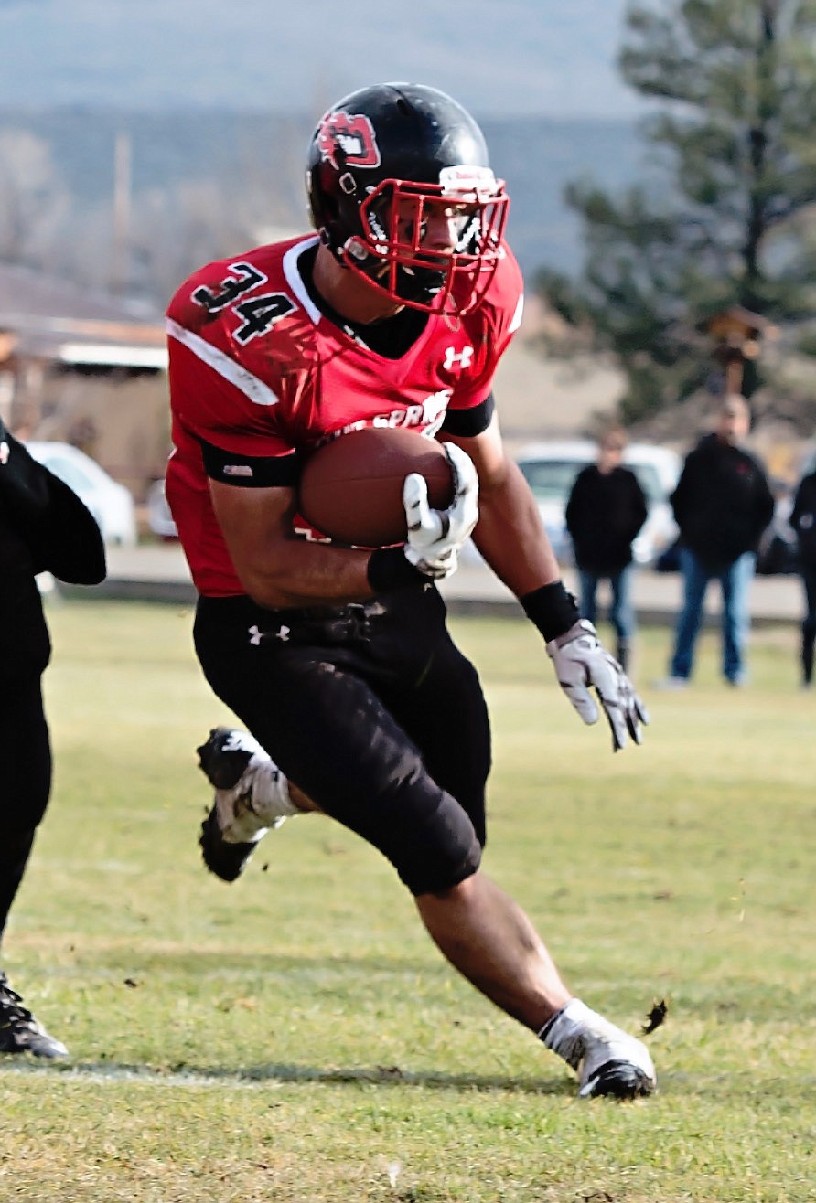 FORMER HOT SPRINGS running back, middle linebacker Kane Lawson, who scored 70 career high school touchdowns, overcame several shoulder problems to achieve his dream of playing college football season with Western Montana University, an NAIA school, in the fall of 2017. (Photo courtesy of Jim Lawson)