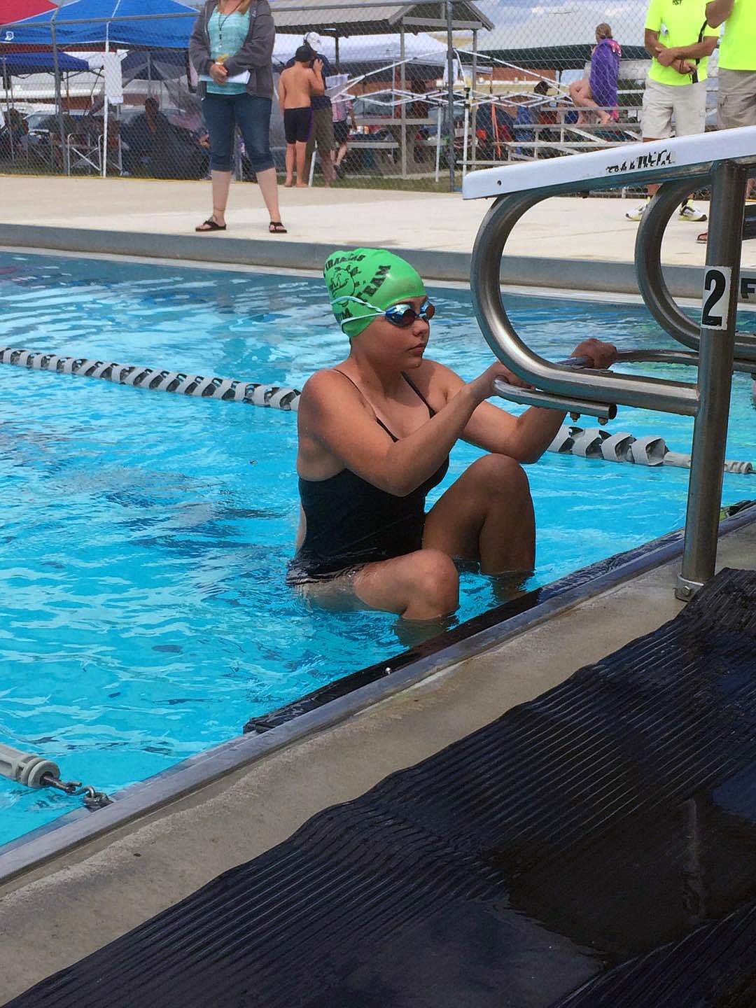 PLAINS PIRANHA swimmer Rachel McNulty is getting out of the pool after a recent competition. (photo courtesy of Danika Whitcomb)