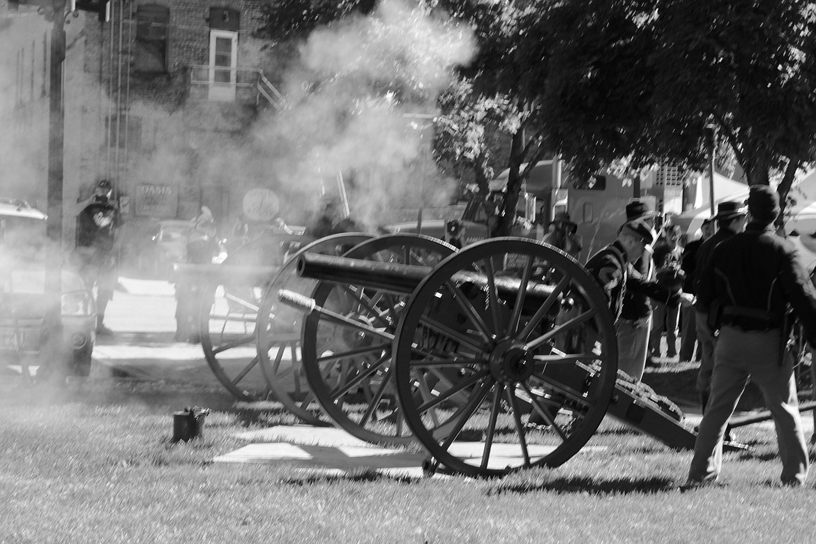 Battery I and M fire their cannons as Col. Wallace&#146;s headstone is revealed.