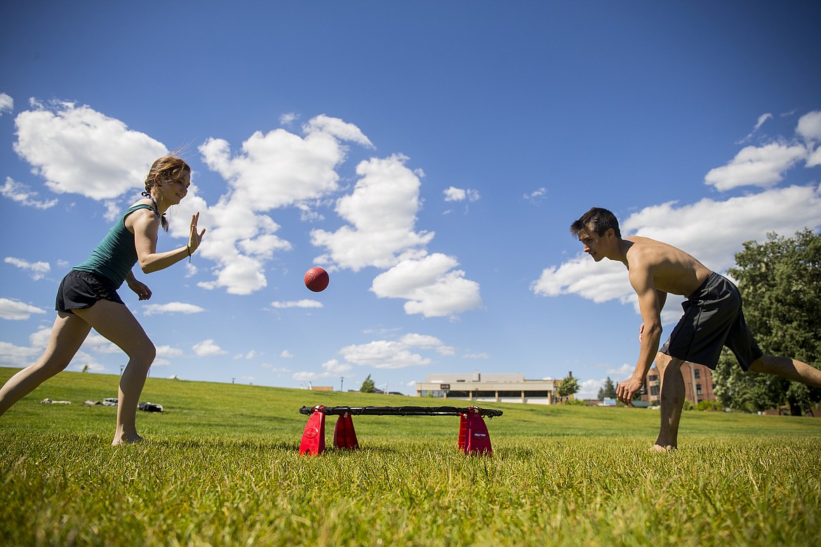 LOREN BENOIT/PressSavanah Everett and Kekoa Porter play spike ball at McEuen Park during a nice sunny day on Tuesday.