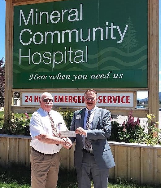 Dennis Cooper, a trustee with the Montana State Elks Association, presents Mineral Community Hospital CEO Ron Gleason with a check for $2,700 for a new Lifepak Cardiac Monitor/Defribrillator. (Photo by Monte Turner)