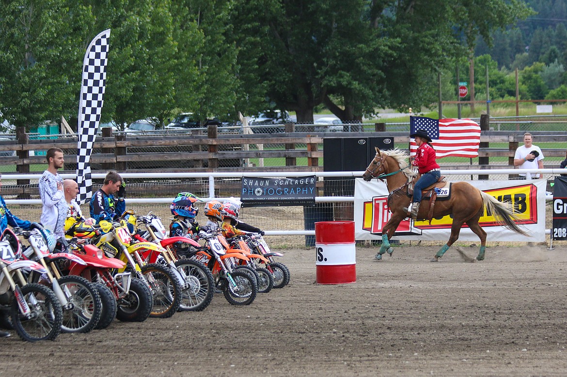 Photo by Mandi Bateman
Lenora Norton carried the American flag around the arena on Sassy during the National Anthem.