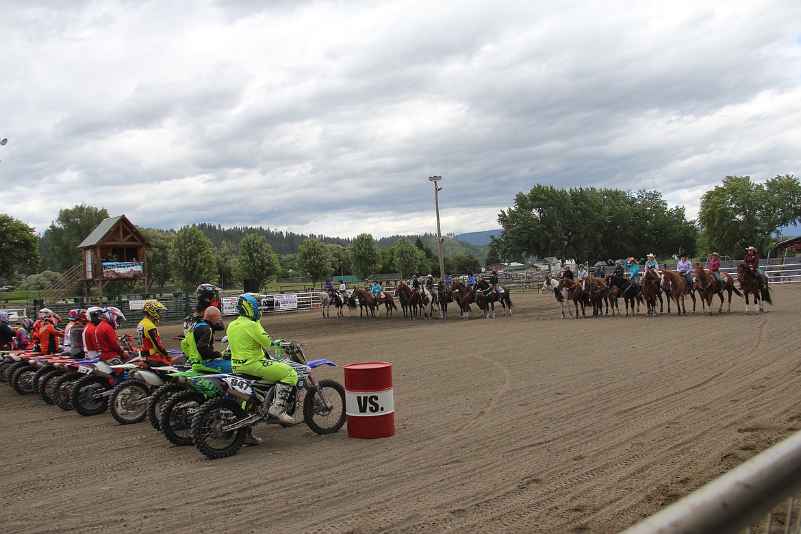 Photo by Tanna Larsen
Horses and bikers line up in a standoff for the event Horsepower Collides!