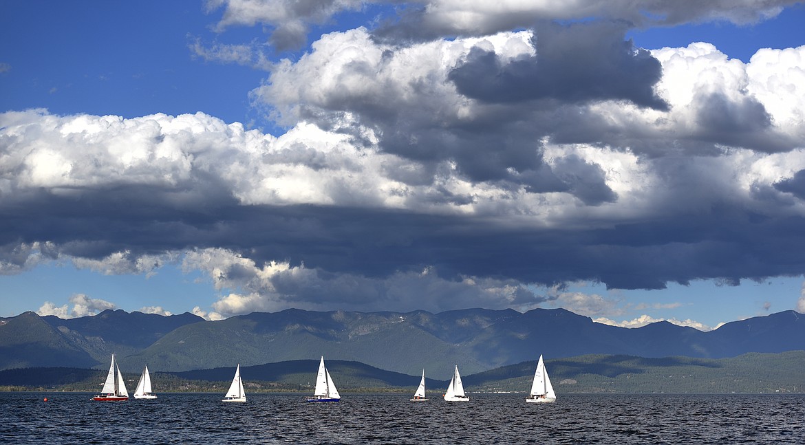 Sailboats race under a perfect sky on June 20, near Somers, in the Del&#146;s Tuesday Night Series on Flathead Lake.