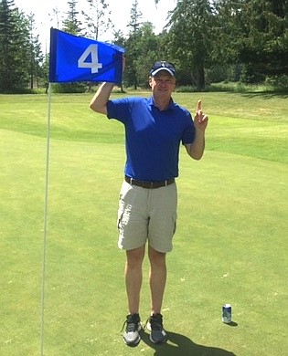 (Courtesy photo)
Local golfer Jim Quinn holds up the ball after acing hole No. 4 at the Idaho Club last Saturday, the second time he&#146;s accomplished the extremely rare feat.