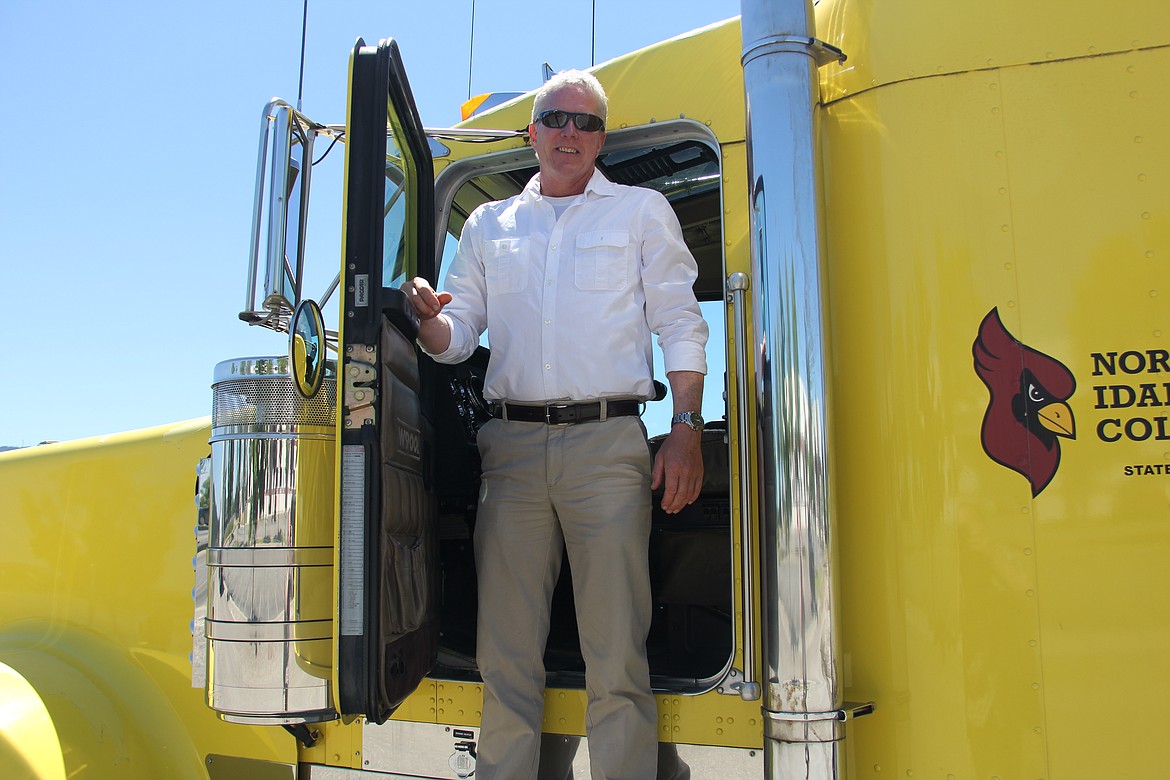 (Photo by TOM GREENE, North Idaho College)
NIC CDL instructor Doug Odegaard with one of the trucks in NIC&#146;s fleet.