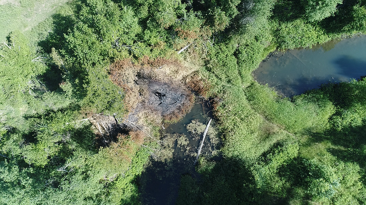 Photo courtesy of IDL. 
The UAS takes a closer view of the fire area as it hovers over it. Hovering the UAS in place above a problem area assists fire crews in reaching the exact location.