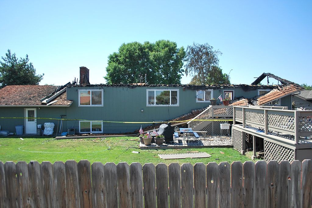 Bob Kirkpatrick/The Sun Tribune - A view from the backside of the Logan home that was destroyed by fire.