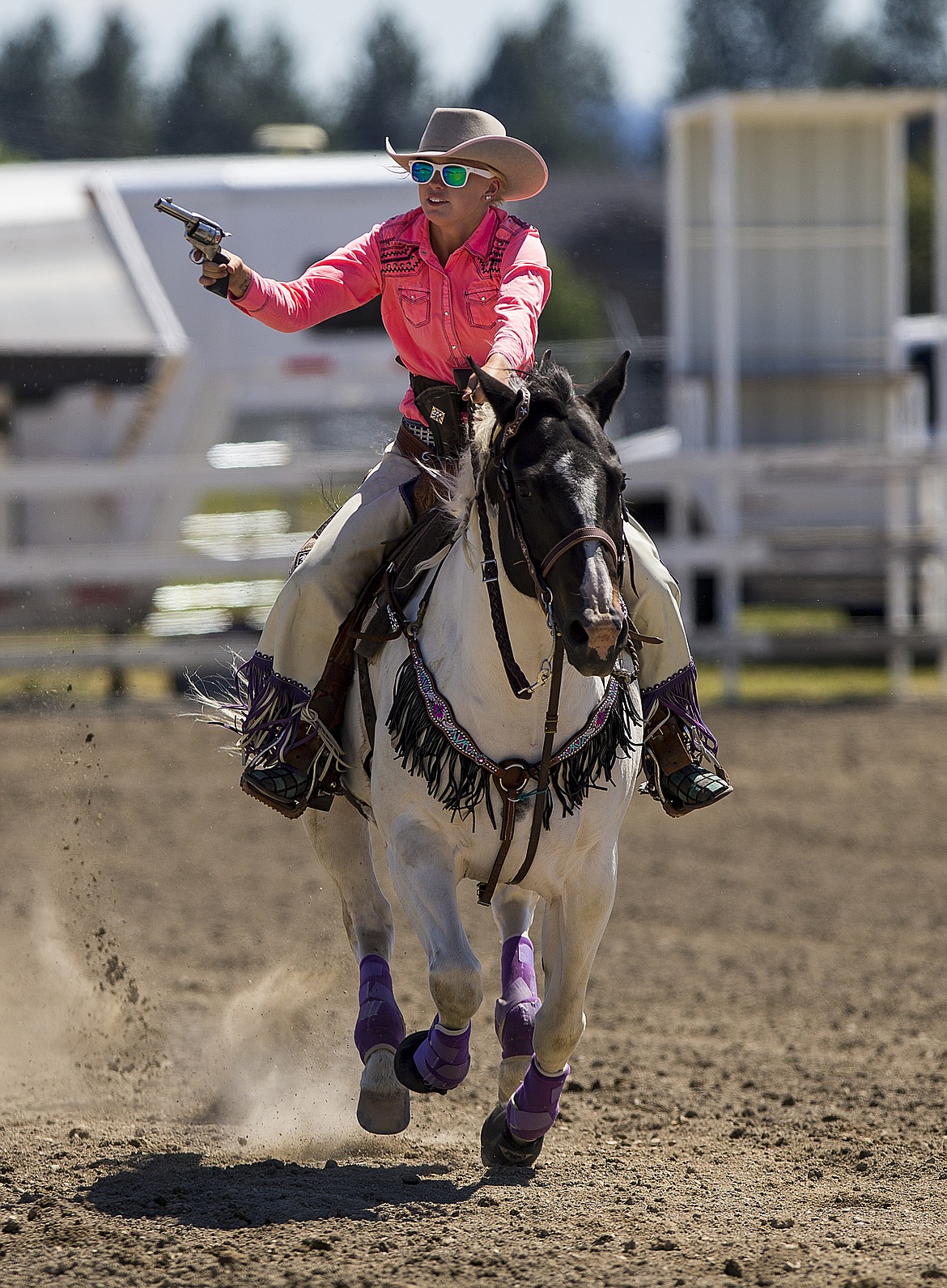 LOREN BENOIT/PressBlair Anderson, of Athol, rides the mounted shooting course Friday afternoon at the Kootenai County Fairgrounds. Northwest Mounted Shooting holds the competition at the fairgrounds once each year around the same time.  Western division&#146;s competition is held in Las Vegas, and the World Championship is held in Texas.