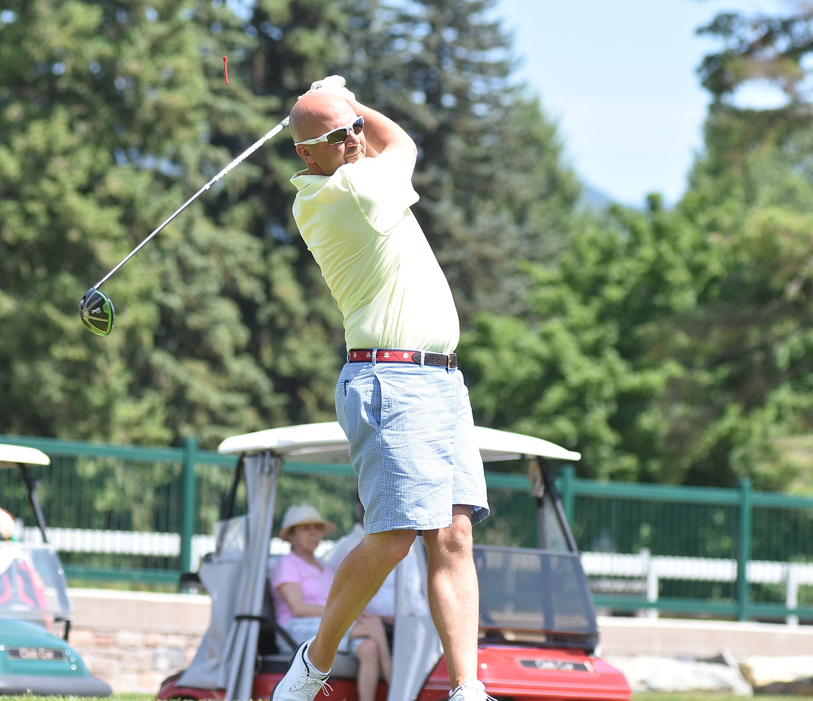 Shawn Tucker tees off on No. 1 of the South Course on day three of the 4th of July Tournament at Whitefish Lake Golf Club.