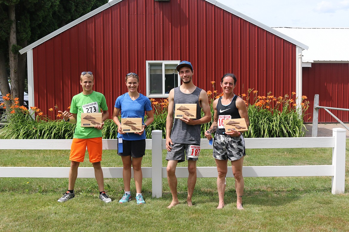 Overall winners, from left: Matthais Merrill, men&#146;s 5K; Taylor Merrill, women&#146;s 5K; Jesse Gondek, men&#146;s 10K; and Darce Claus, women&#146;s 10K.