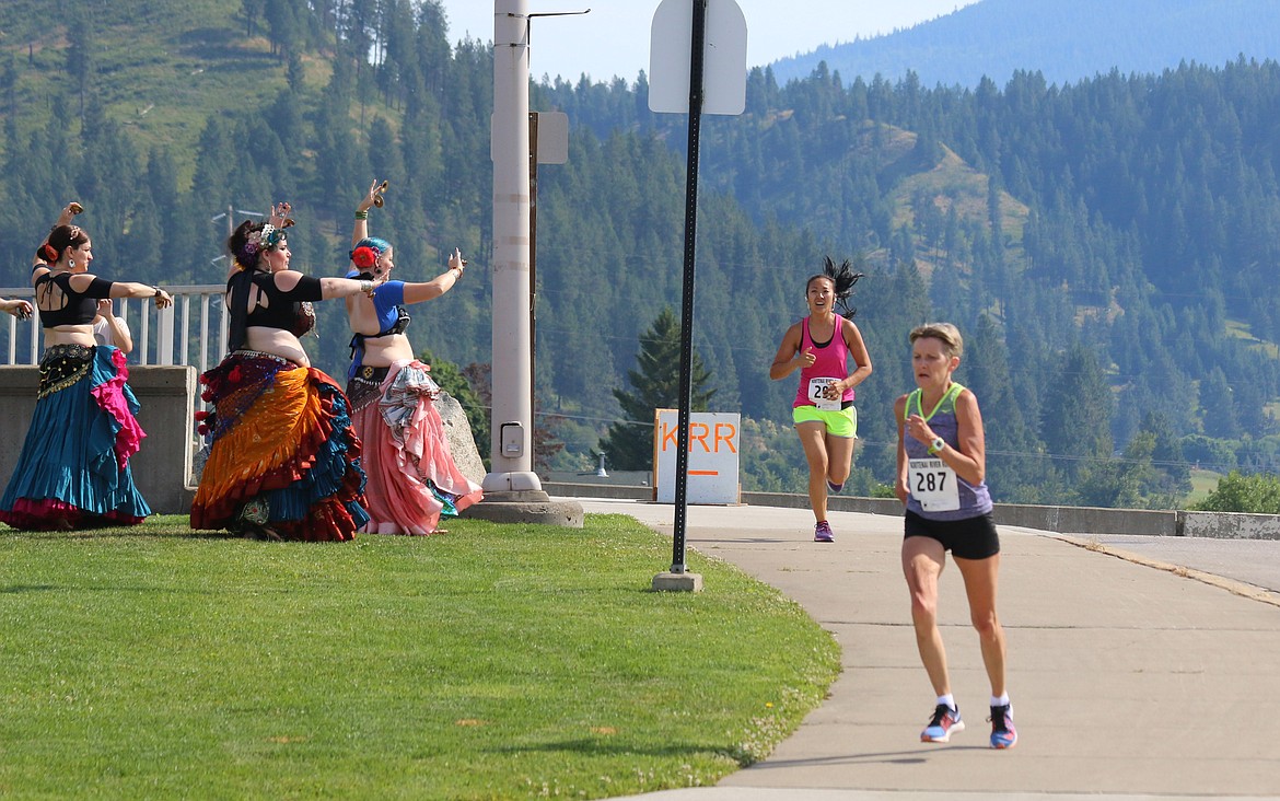 Devotion Tribal Belly Dancers wave and entertain the runners during the Kootenai River Run.