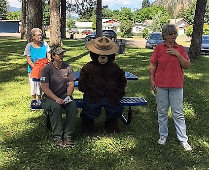 Smokey the Bear visited with area kids during the Mineral County Library Summer Reading Program on June 27 in Superior (Photos by Florance Evans).
