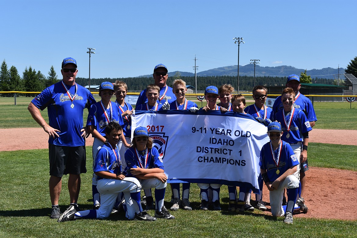 Courtesy photo
The Coeur d&#146;Alene Little League 9-11 year-old all-star team defeated Hayden 2 games to 1 to win the Idaho District 1 championship and advance to the state playoffs July 28-30 at Croffoot Park in Hayden. In the front row from left are Kyle Seman, Zeb Blattstein and Avery Cherry; and back row from left, manager Sean Cherry, Zane Blattstein, Brady Hicks, AJ Currie, coach Jeffrey Smith, Austin DeBour, Jake Dannenberg, Braeden Newby, Sawyer Wilson, Cooper Smith, Cooper Erickson and coach Manny Azevedo.