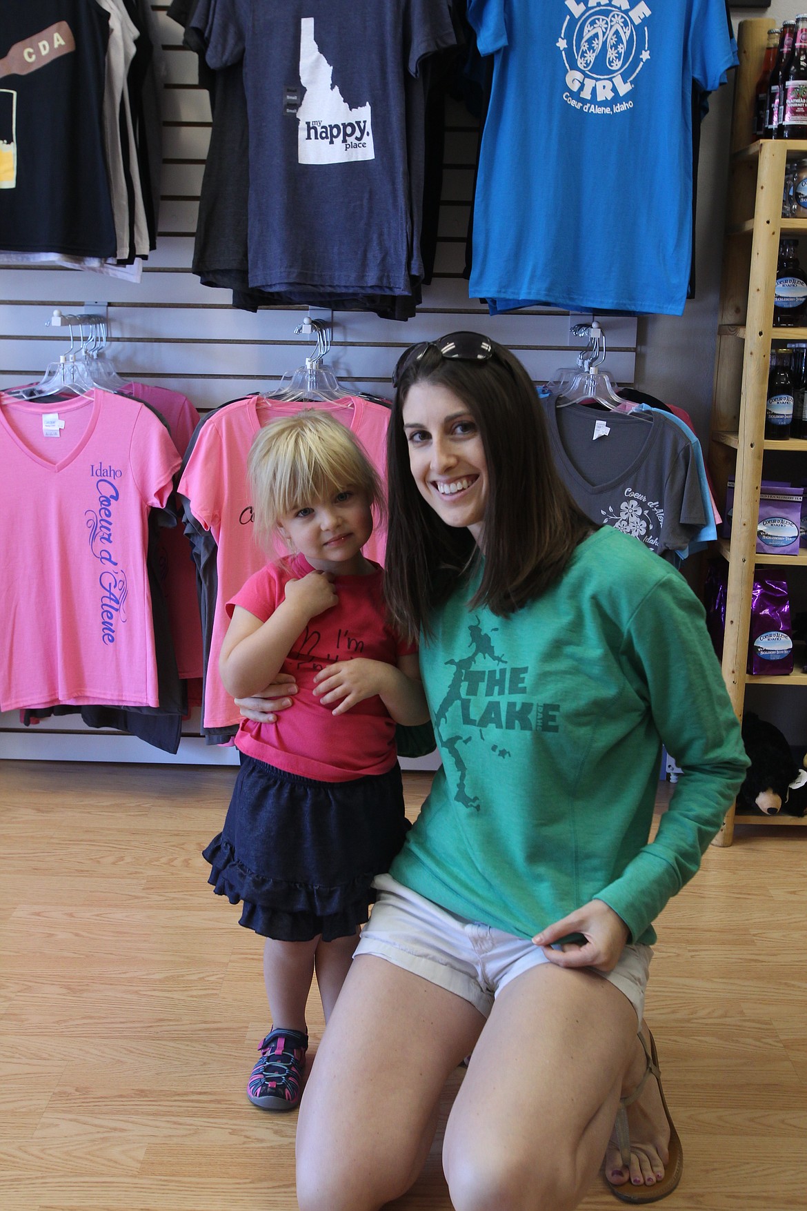 MITCHELL BONDS/Press
Malia Mapston, right, and her daughter Rylie, 3, of Richland, Wash., pose to show off Malia&#146;s new Lake Cd&#146;A shirt on Sunday morning, designed in-house at Coeur d&#146;Alene Souvenir.