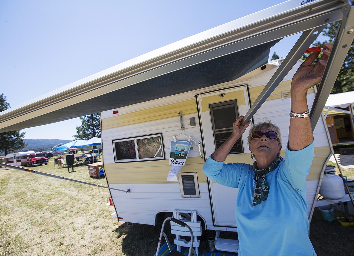 LOREN BENOIT/PressBillie DeWilde sets up her vintage trailer prior to this weekend's third annual Fuddy Duddy Cruisers Vintage Trailer Rally at River of Life Friends Church in Post Falls.