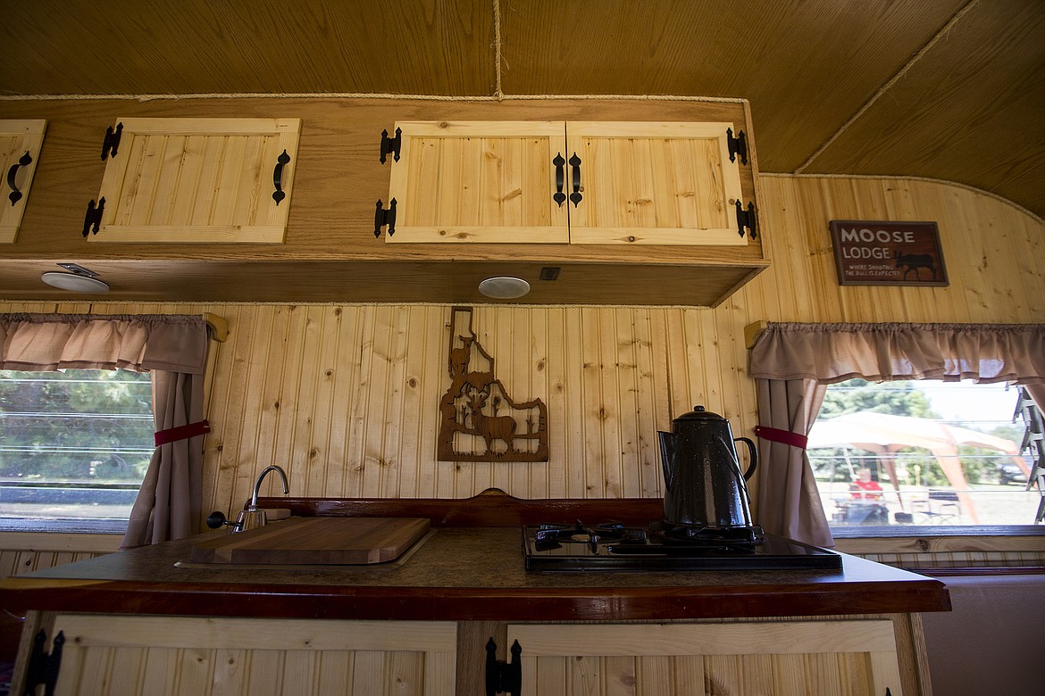 LOREN BENOIT/Press Wayne and Laura gutted out the interior of their trailer and oak cabinets for a warm and welcoming feeling. The trailer will be on display at this weekend's third annual Fuddy Duddy Cruisers Vintage Trailer Rally at River of Life Friends Church in Post Falls.