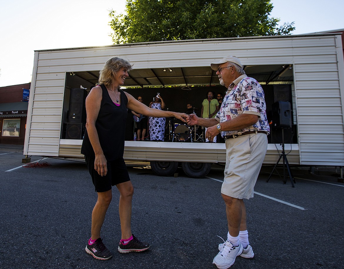 LOREN BENOIT/PressNancy and Loren Walz dance together to live music from Nu jack City at Rathdrum Days on Friday.