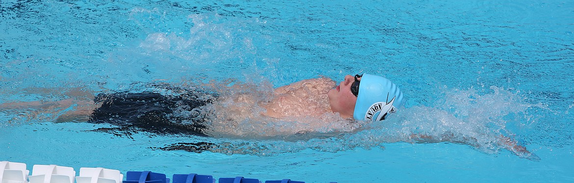Connor Vanderweyst/Columbia Basin Herald
Nicholas Moore swims the backstroke during the Sizzlin' Summer Open.