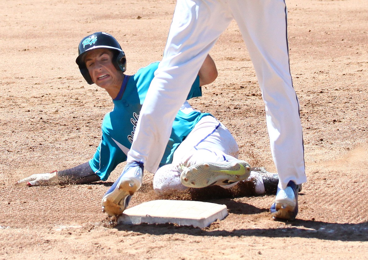 Rodney Harwood/Columbia Basin HeraldBasin Rockhounds runner Colton Minoletti slides into third base in the second inning of Saturday's Northern Washington Senior Babe Ruth state championship.