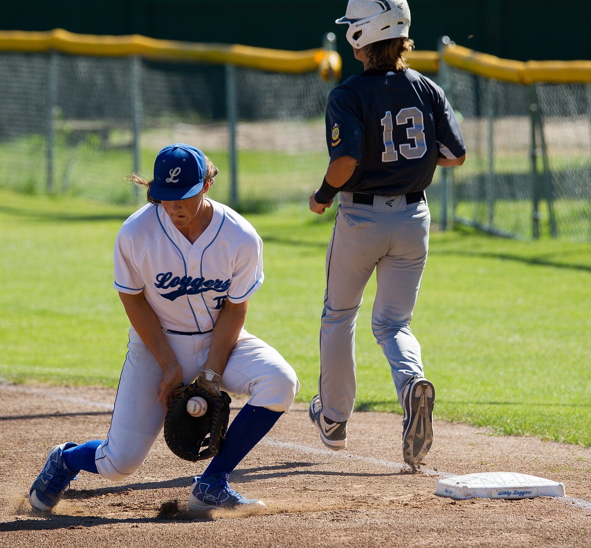 Glacier&#146;s Ryan ?Veneman beats the throw to Libby first baseman Shayne Walker in the first game Friday.