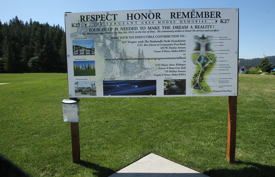 DEVIN HEILMAN/Press
This sign stands at the future site of the Sgt. Greg Moore K27 Memorial near the Fourth Street entrance to McEuen Park. The Panhandle Parks Foundation had a table in the park Tuesday to update the community about the memorial&#146;s progress as well as invite people to contribute to the McEuen Donor Wall.