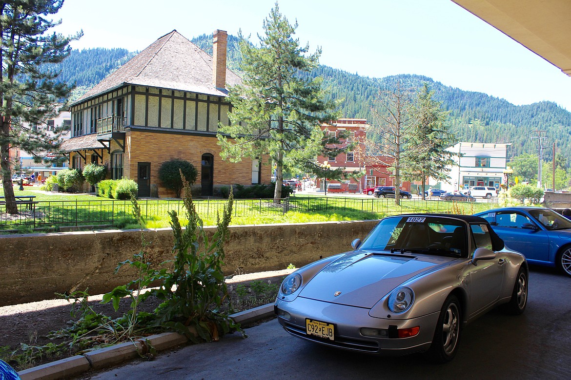 Photo by Chanse Watson. 
Porsches line up on the Trail of the Coeur d'Alenes next to the Coeur d'Alene River in Wallace.