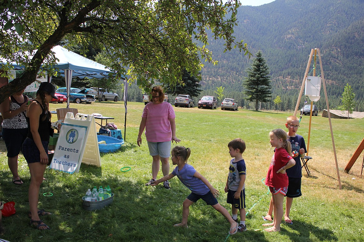 A ring toss entertains the kids during the fun in Alberton.