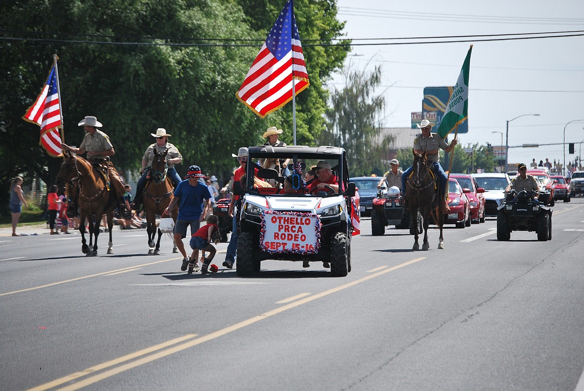 Bob Kirkpatrick/The Sun Tribune - Adams County Sheriff Posse was one of several entrants in Othello&#146;s Fourth of July parade. The day was full of fun-filled activities for all ages.