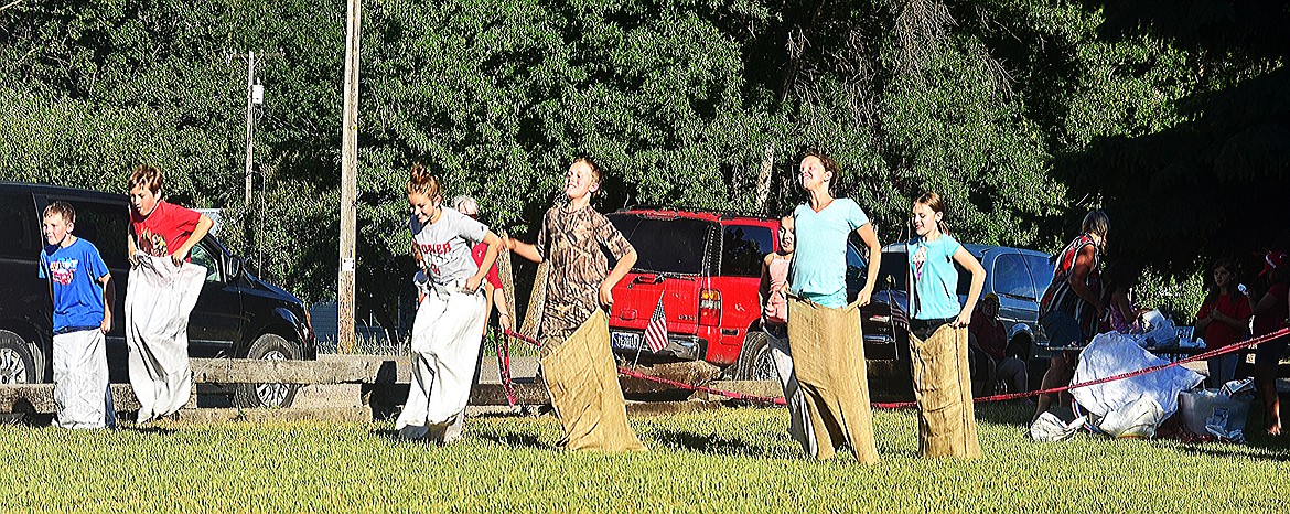 SACK RACE was just one of the many fun games available for kids as Paradise celebrated the 4th of July last week. (Erin Jusseaume/Clark Fork Valley Press)