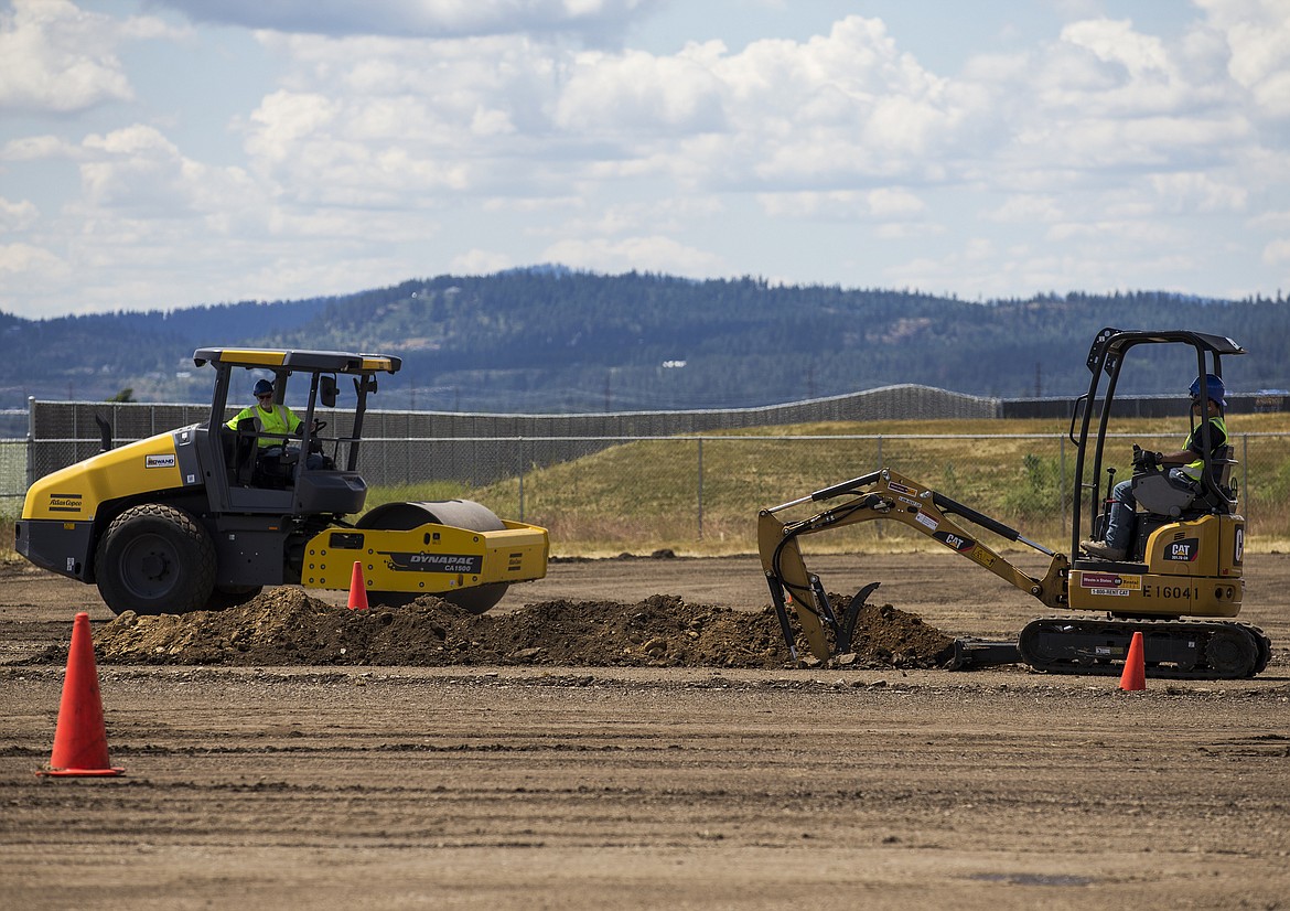 LOREN BENOIT/Press

With construction booming across Idaho, the Idaho Transportation Department is providing hands-on training for heavy equipment operators to help fill the skilled labor employment gap. Here, two students operate machinery during a heavy equipment showcase at Kootenai Technical Education Campus on Thursday.