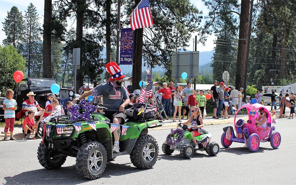 Brightly colored ATVs joined the parade line-up along with a special pink pumpkin mobile.