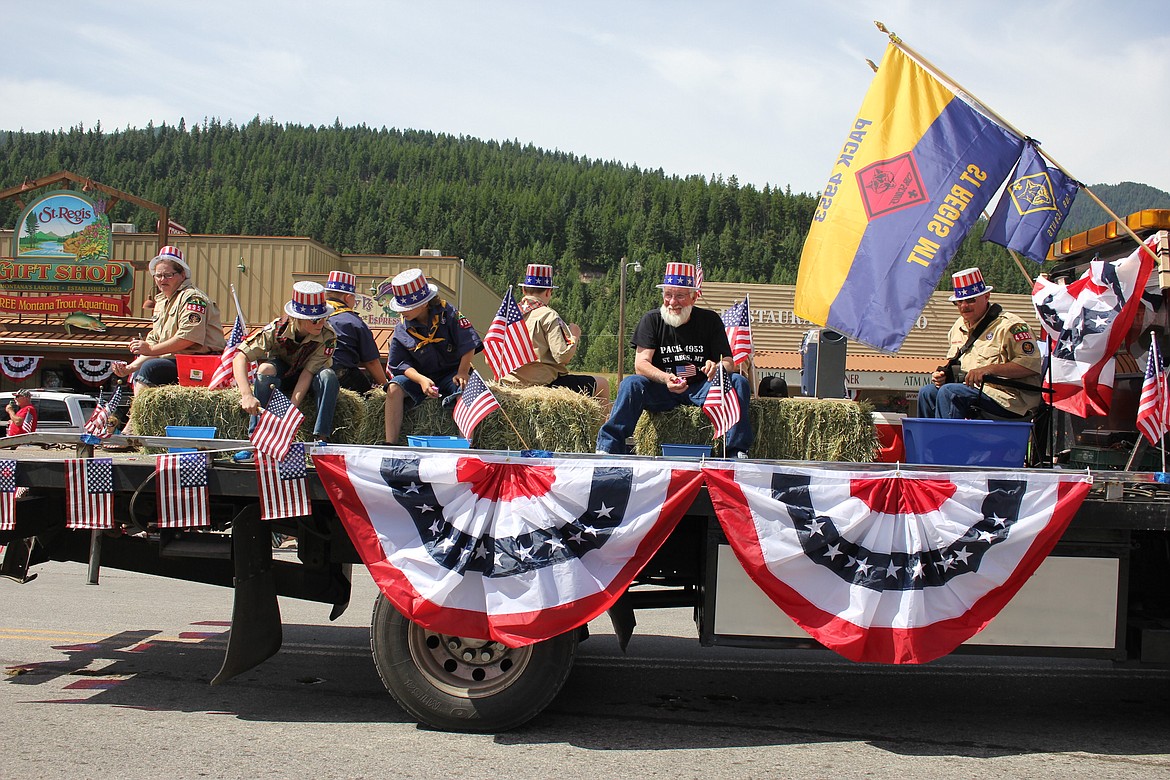 Cub Scout Troop 4953 celebrates the birth of the nation in their red, white and blue float during the parade.