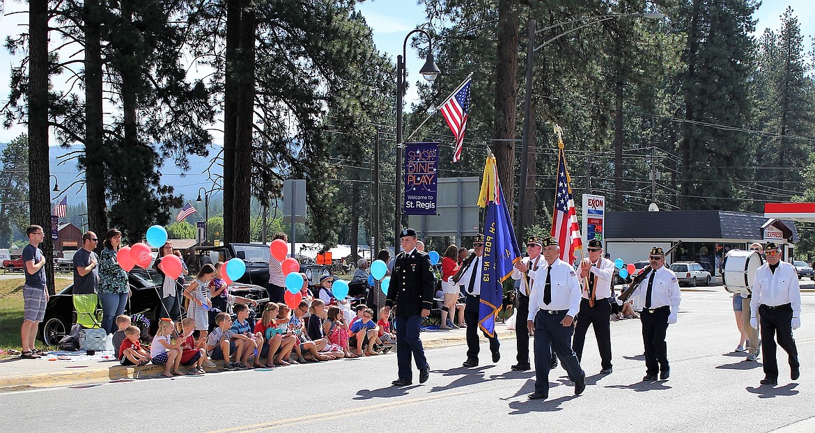 Members of the American Legion lead the Fourth of July parade in St. Regis.