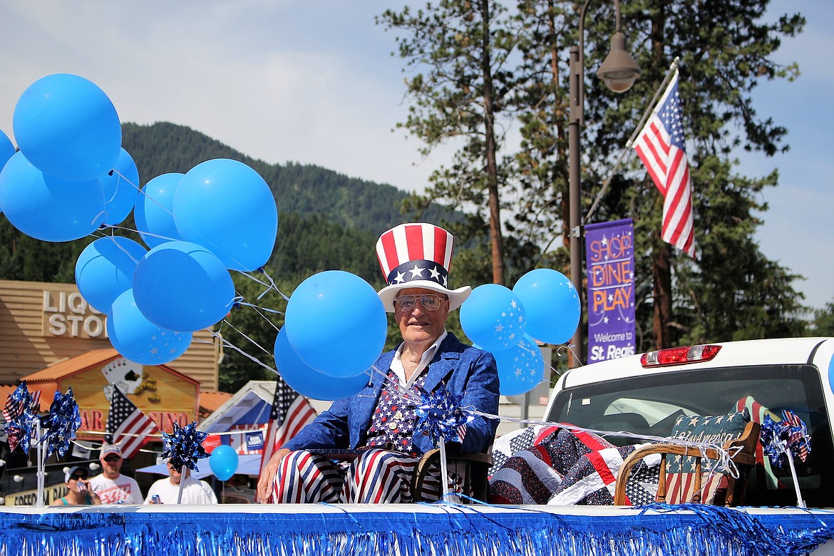 World War II veteran Joe Magone dressed up as Uncle Sam and rode down the parade route for the Democratic Party float.