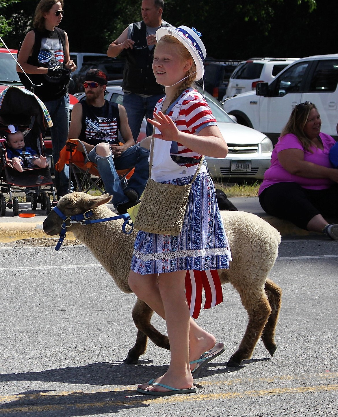 Macy Hill and her lamb get into the spirit of Independence Day.