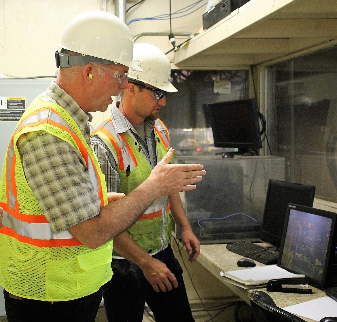 Newly sworn-in U.S. Rep. Greg Gianforte, R-Mont., checks out some of the equipment at Tricon Timber with Vice President of Operations Calvin Sheahan during a July 3 visit in St. Regis. (Kathleen Woodford/Mineral Independent)